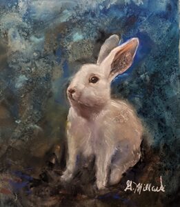 White rabbit sitting against blue textured background