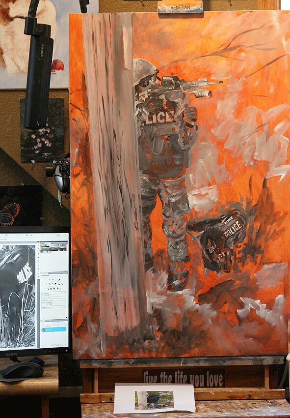 Partially painted tactical officer on orange background