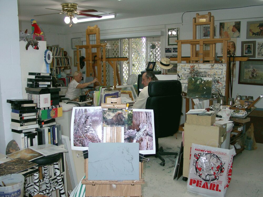Suzie and John working side by side in their studio