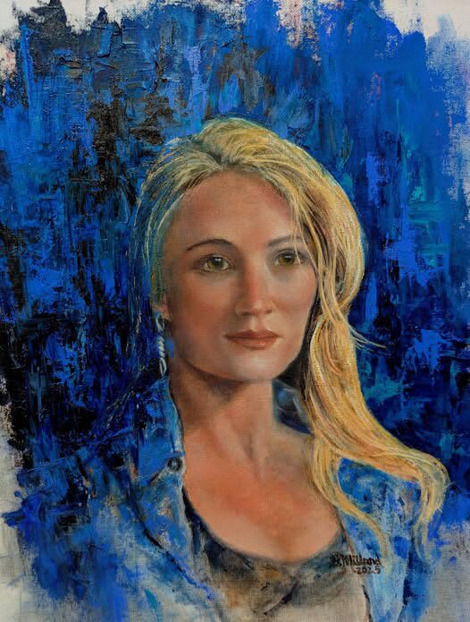 Blonde woman portrait with vibrant blue texture